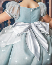 Load image into Gallery viewer, Back of blue princess dress with sheer puff sleeves and oversized silver satin bow