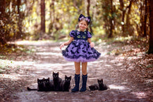 Load image into Gallery viewer, A purple and black cat and bat themed dress with a matching headband, ready for a Halloween party.