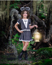 Load image into Gallery viewer, Girls black and white Halloween active dress with pinstripes, tuxedo-style lapels, and an embroidered bat detail.