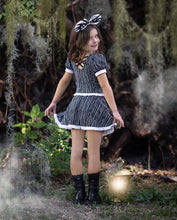 Load image into Gallery viewer, Back view of a girls Halloween active dress featuring a playful criss-cross back detail.