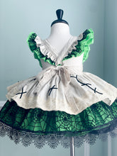 Load image into Gallery viewer, Back view of a girls green and tan Halloween dress with elastic back and adjustable strap loops.