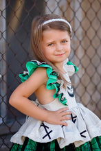 Load image into Gallery viewer, Side view of a girls green and tan Halloween dress with elastic back and adjustable strap loops.