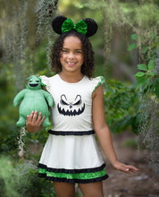 Load image into Gallery viewer, Close-up of the Halloween-inspired boogey fabric and decorative details on a girls active dress.