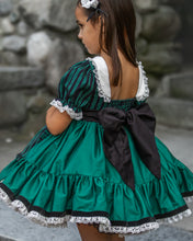 Load image into Gallery viewer, Back of a handmade Halloween dress with elastic bodice, oversized bow, and full layered skirt.