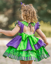Load image into Gallery viewer, Back of a Halloween spider web dress featuring an oversized bow and layered skirt.