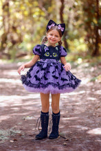 Load image into Gallery viewer, Front view of a boutique girls Halloween dress with bat and cat print, flutter sleeves, and twirl skirt.