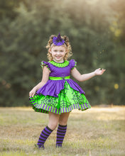 Load image into Gallery viewer, Girls Halloween dress featuring spider webs on purple and green fabric with a full twirl skirt and boutique craftsmanship.
