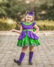 Load image into Gallery viewer, Girls Halloween dress featuring spider webs on purple and green fabric with a full twirl skirt and boutique craftsmanship.
