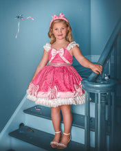 Load image into Gallery viewer, Girl wearing a pink princess costume dress with full lace skirt, satin bows, pearl trim and ruffled shoulders