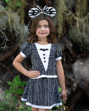 Load image into Gallery viewer, Close-up of the pinstriped bodice with real lapels, black buttons, and embroidered bat detail.
