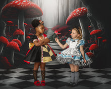 Load image into Gallery viewer, Red, black, and gold boutique dress with heart detailing.