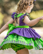 Load image into Gallery viewer, Full layered twirl skirt with coordinating Halloween fabrics and boutique finishing.