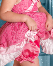 Load image into Gallery viewer, Detail of girls pink princess dress with satin bow, lace skirt, pearl ruffles and matching pink bloomers