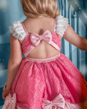 Load image into Gallery viewer, Back of girls pink princess dress showing open-back cutout, satin bow, elastic waist and pearl ruffle straps