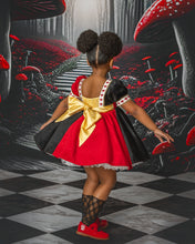 Load image into Gallery viewer, Back of a boutique dress with oversized satin bow and full layered skirt.