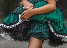Load image into Gallery viewer, Layered twirl skirt with velvet trim and lace accents on a handmade girls Halloween dress.