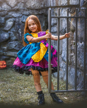 Load image into Gallery viewer, Sally inspired boutique dress for girls with colorful patchwork skirt.