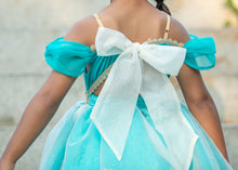 Load image into Gallery viewer, Back detail of turquoise princess dress with adjustable straps, elastic waist and large sheer tie bow