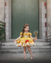 Load image into Gallery viewer, Girl in yellow and gold princess costume dress with embroidered lace skirt and red bow accents