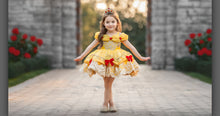 Load image into Gallery viewer, Girls yellow princess costume dress with ornate gold lace, red bows and layered fairytale skirt