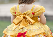Load image into Gallery viewer, Yellow princess dress featuring large gold satin back bow and delicate red rose shoulder accents